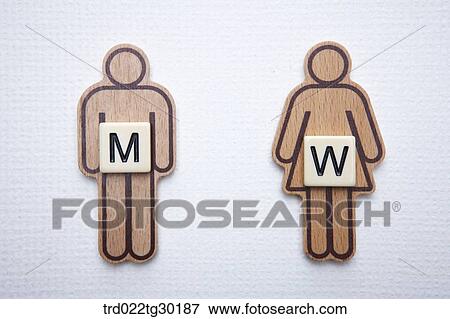 Stock Photo - Man wooden block and woman wooden block . Fotosearch