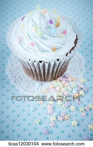 Mint chocolate cupcake with star decoration View Large Photo Image Picture - Mint chocolate cupcake with star decoration . Fotosearch