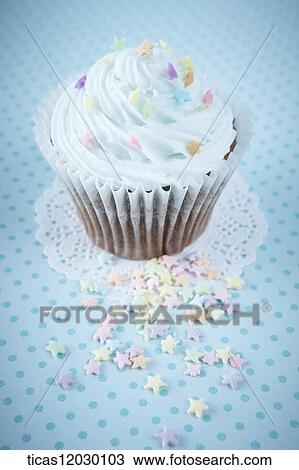 Mint chocolate cupcake with star decoration View Large Photo Image Stock Image - Mint chocolate cupcake with star decoration . Fotosearch
