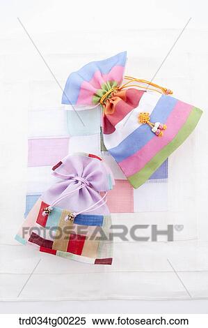 Patched colorful lucky bags View Large Photo Image Stock Photography - Patched colorful lucky bags. Fotosearch
