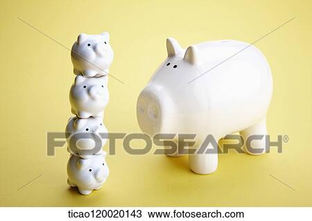 Piled baby piggy banks and mom piggy bank View Large Photo Image Stock Image - Piled baby piggy banks and mom piggy bank. Fotosearch