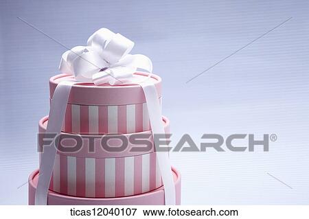 Pink gift box with white ribbon View Large Photo Image Stock Photo - Pink gift box with white ribbon . Fotosearch