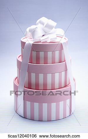 Pink gift box with white ribbon View Large Photo Image Stock Photograph - Pink gift box with white ribbon . Fotosearch