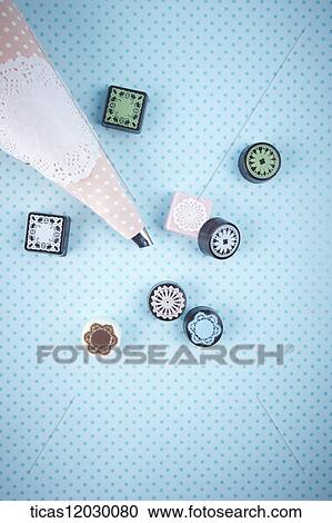 Pink icing bag and lace patterned chocolate View Large Photo Image Stock Image - Pink icing bag and lace patterned chocolate. Fotosearch
