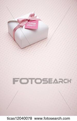 Pink ribbon gift box and I love you card View Large Photo Image Stock Photo - Pink ribbon gift box and I love you card. Fotosearch
