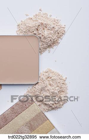 Stock Photography - Pressed foundation and eye shadow. Fotosearch