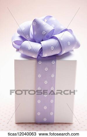 Purple polka dot ribbon gift box View Large Photo Image Stock Image - Purple polka dot ribbon gift box. Fotosearch