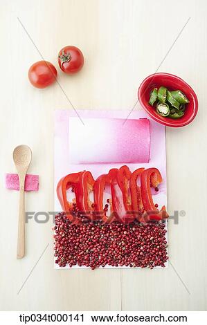 Stock Image - Red paprika and dried berry salad. Fotosearch