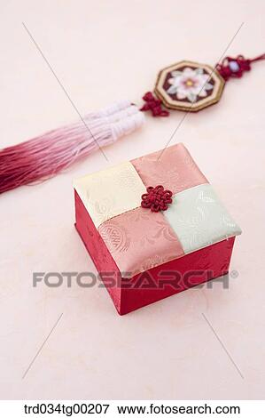 Red patched traditional box and red traditional accessory View Large Photo Image Stock Photo - Red patched traditional box and red traditional accessory . Fotosearch