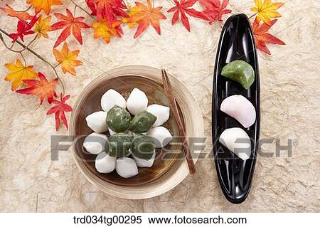 Rice cake with colored leaves around View Large Photo Image Stock Photography - Rice cake with colored leaves around. Fotosearch