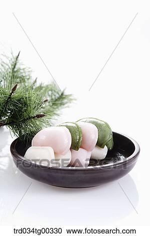 Stock Image - Rice cake with pine branch . Fotosearch