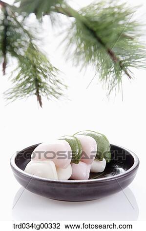 Stock Image - Rice cake with pine branch . Fotosearch