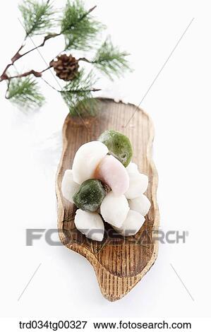 Stock Photo - Rice cake with pine branch . Fotosearch