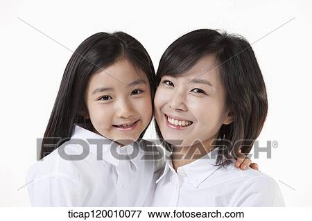 Smiling mother and daughter View Large Photo Image Stock Photo - Smiling mother and daughter. Fotosearch