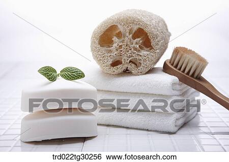 Soaps, folded towels, and bath tools View Large Photo Image Stock Photograph - Soaps, folded towels, and bath tools. Fotosearch