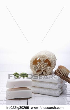 Soaps, folded towels, and bath tools View Large Photo Image Stock Photography - Soaps, folded towels, and bath tools. Fotosearch