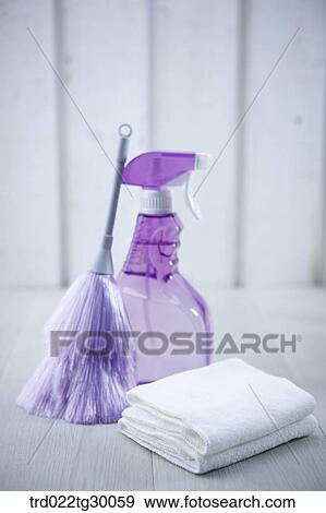 Stock Photo - sprays and brush with towels. Fotosearch