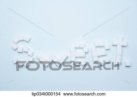 Sweet letters with lumps of sugar View Large Photo Image Picture - Sweet letters with lumps of sugar. Fotosearch