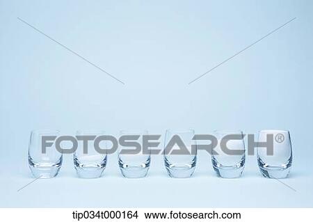 Picture - The glasses of milk in a line. Fotosearch