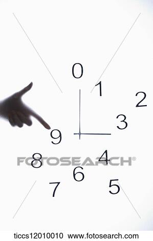 The hand pointing to the nine o'clock View Large Photo Image Stock Image - The hand pointing to the nine o'clock. Fotosearch