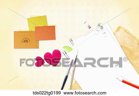 Stock Photo - The image of letter, pencil, paint brushes, and pink heart. Fotosearch