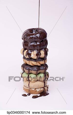 The pile of chocolate donut View Large Photo Image Picture - The pile of chocolate donut. Fotosearch