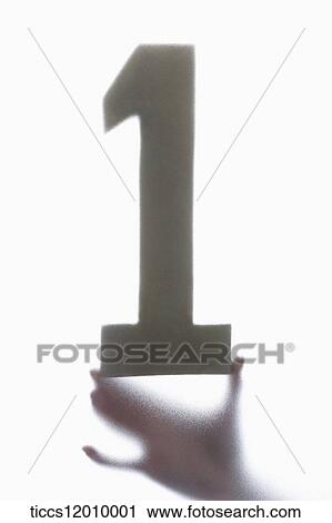 The shadow of hand holding the number one View Large Photo Image Stock Image - The shadow of hand holding the number one. Fotosearch