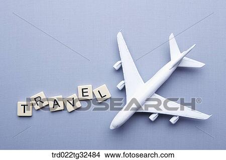 Picture - Travel blocks with an airplane model . Fotosearch