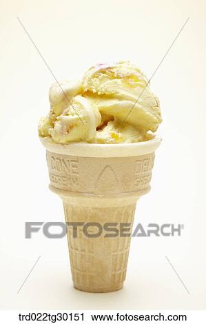 Stock Image - Vanila ice cream cone. Fotosearch