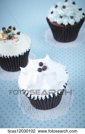 Stock Image - Various tastes of cupcakes. Fotosearch
