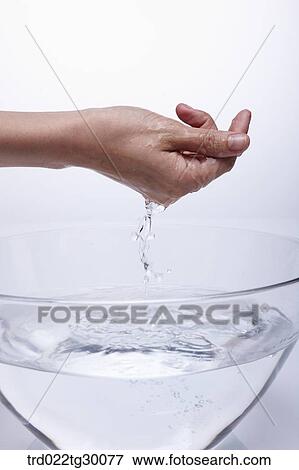 washing hand in basin View Large Photo Image Stock Photo - washing hand in basin. Fotosearch