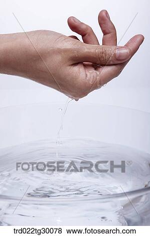 washing hand in basin View Large Photo Image Stock Photo - washing hand in basin. Fotosearch