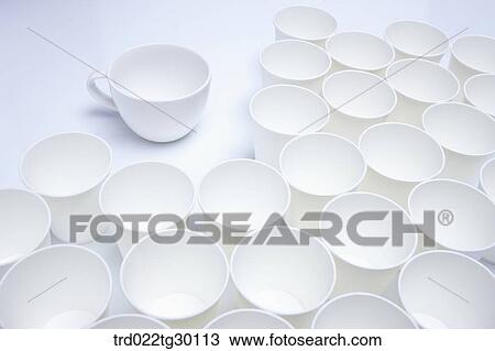 Stock Image - White paper cup and white mug. Fotosearch