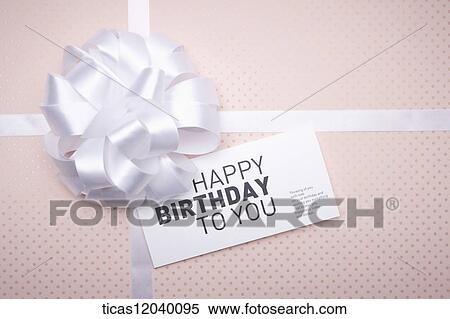 White ribbon and birthday card View Large Photo Image Stock Photography - White ribbon and birthday card. Fotosearch