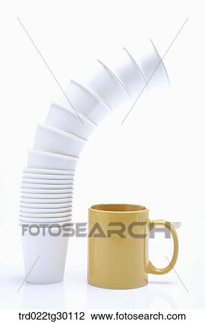 Winding pack of paper cup and yellow mug View Large Photo Image Stock Image - Winding pack of paper cup and yellow mug. Fotosearch