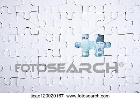 Stock Photo - Won in the pieces of puzzle. Fotosearch