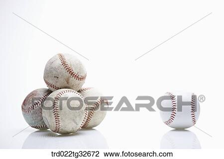 Worn out baseballs and a clean baseball View Large Photo Image Stock Image - Worn out baseballs and a clean baseball. Fotosearch
