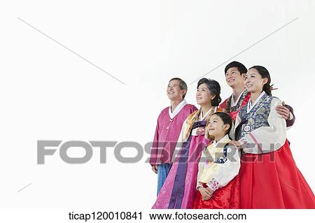 a big family in Hanbok facing same place smiling View Large Photo Image Stock Image - a big family in Hanbok facing same place smiling. Fotosearch