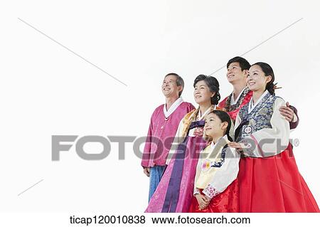 a big family in Hanbok facing same place smiling View Large Photo Image Stock Photo - a big family in Hanbok facing same place smiling. Fotosearch