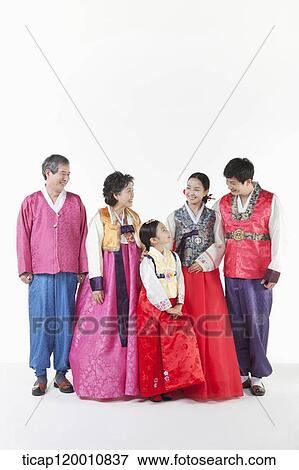 a big family in Hanbok posing together View Large Photo Image Stock Photo - a big family in Hanbok posing together. Fotosearch