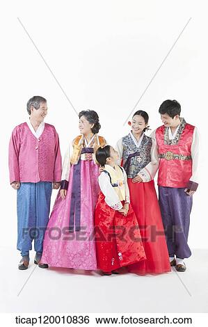 a big family in Hanbok posing together View Large Photo Image Stock Photograph - a big family in Hanbok posing together. Fotosearch