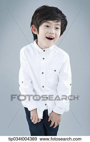 a boy in white shirt laughing View Large Photo Image Stock Photo - a boy in white shirt laughing . Fotosearch