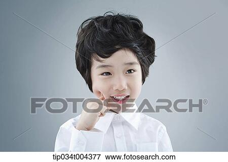 Stock Photo - a boy posing . Fotosearch