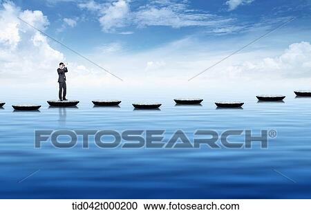 Stock Image - a businessman on a stone bridge . Fotosearch