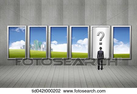 a businessman standing in front of a frame with question mark View Large Photo Image Stock Image - a businessman standing in front of a frame with question mark. Fotosearch