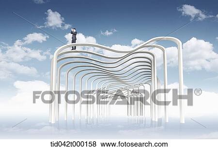 a businessman standing on a tunnel in the sky View Large Photo Image Stock Photo - a businessman standing on a tunnel in the sky. Fotosearch