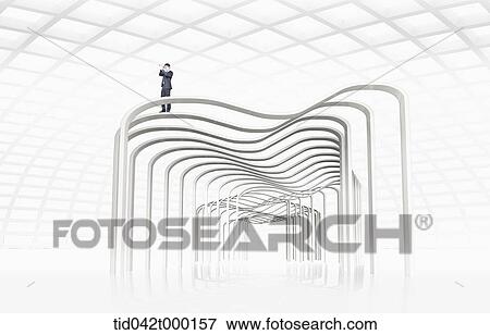 Stock Photo - a businessman standing on a tunnel. Fotosearch