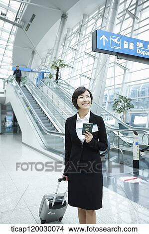 a businesswoman in a Incheon airport View Large Photo Image Picture - a businesswoman in a Incheon airport. Fotosearch