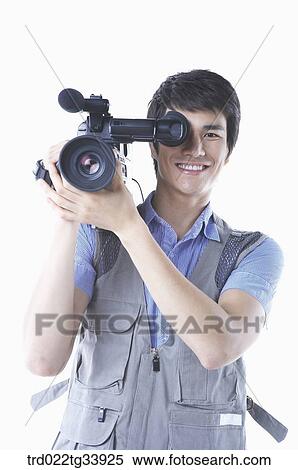 Stock Photography - a cameraman in white background . Fotosearch