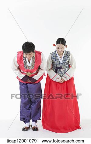 a couple bowing wearing Hanbok View Large Photo Image Stock Image - a couple bowing wearing Hanbok . Fotosearch